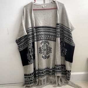 Lightly used poncho, no stains or wear-n-tear